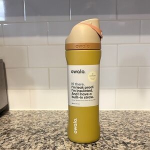 Owala Insulated Water Bottle In The Exclusive Color Sunflower Bouquet.